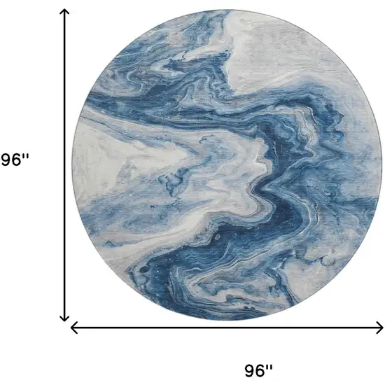8' Navy Blue And Ivory Abstract Washable Round Rug With UV Protection Photo 9