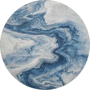 Photo of 8' Navy Blue And Ivory Abstract Washable Round Rug With UV Protection
