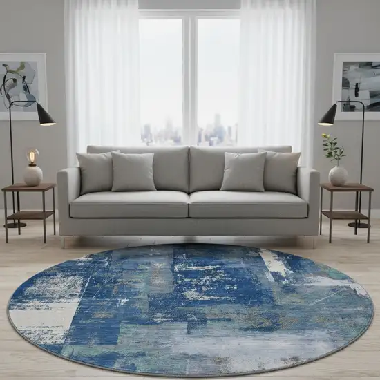 8' Navy Blue And Ivory Abstract Washable Round Rug With UV Protection Photo 2