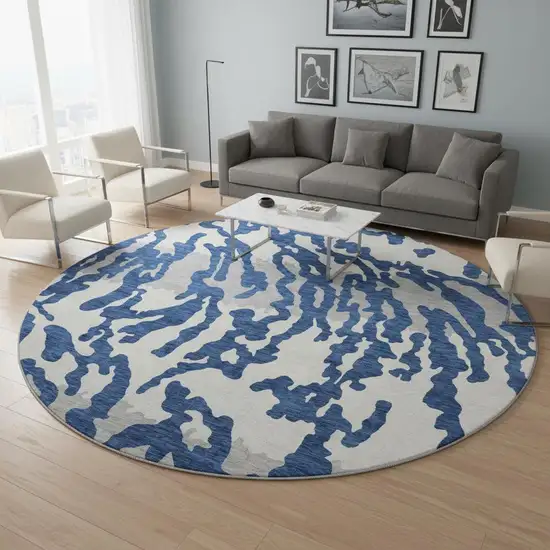 8' Navy Blue And Ivory Animal Print Washable Round Rug With UV Protection Photo 2