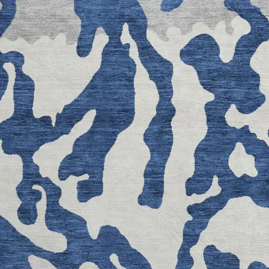 8' Navy Blue And Ivory Animal Print Washable Round Rug With UV Protection Photo 3