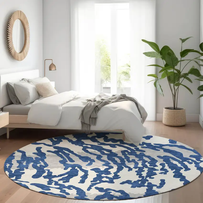 8' Navy Blue And Ivory Animal Print Washable Round Rug With UV Protection Photo 5