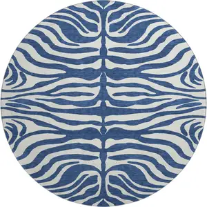 Photo of 8' Navy Blue And Ivory Animal Print Washable Round Rug With UV Protection