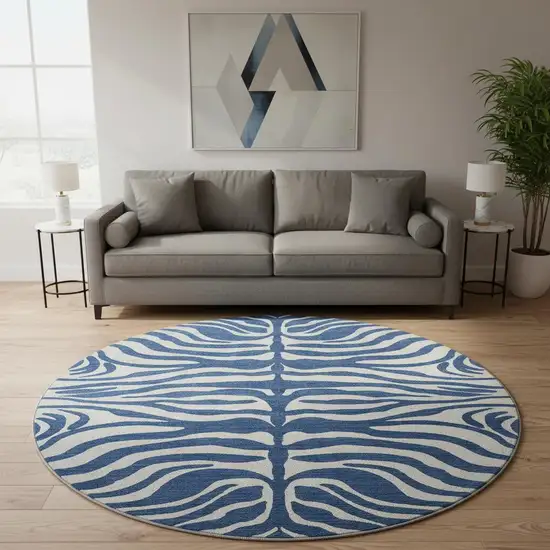 8' Navy Blue And Ivory Animal Print Washable Round Rug With UV Protection Photo 2