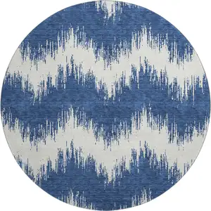 Photo of 8' Navy Blue And Ivory Chevron Washable Round Rug With UV Protection