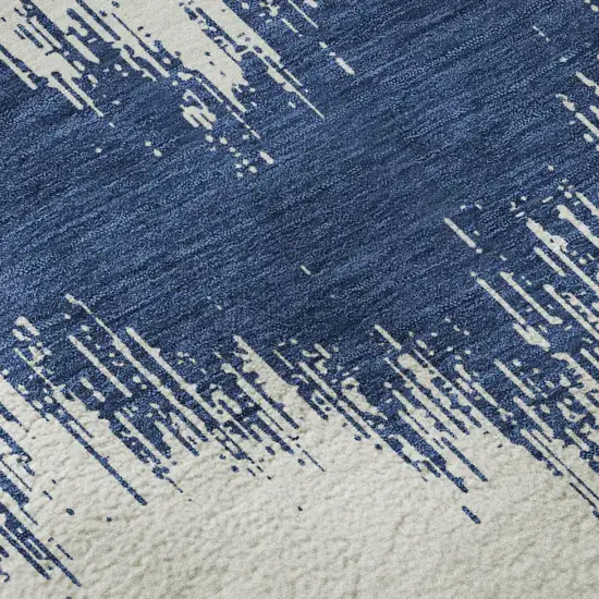 8' Navy Blue And Ivory Chevron Washable Round Rug With UV Protection Photo 9