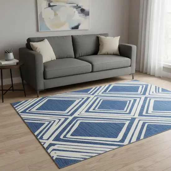 8' Navy Blue And Ivory Diamond Washable Round Rug With UV Protection Photo 2