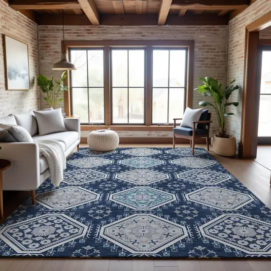 8' Navy Blue And Ivory Floral Washable Area Rug With UV Protection Photo 5
