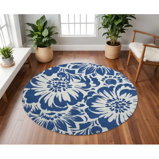 8' Navy Blue And Ivory Floral Washable Round Rug With UV Protection Photo 2