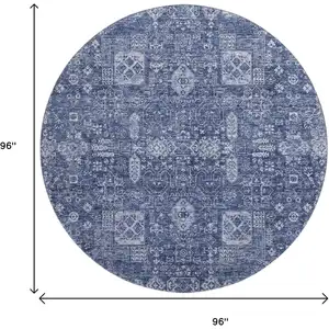 Photo of 8' Navy Blue And Ivory Floral Washable Round Rug With UV Protection