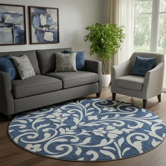8' Navy Blue And Ivory Floral Washable Round Rug With UV Protection Photo 1