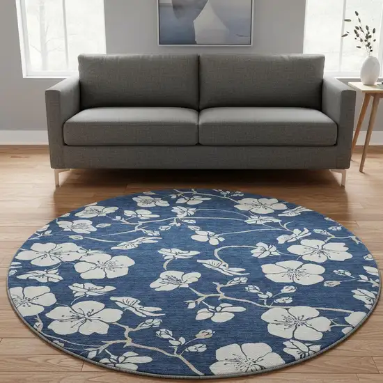 8' Navy Blue And Ivory Floral Washable Round Rug With UV Protection Photo 2