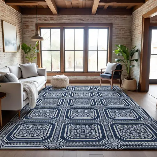 8' Navy Blue And Ivory Geometric Washable Area Rug With UV Protection Photo 5