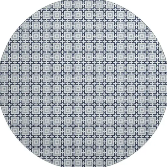 8' Navy Blue And Ivory Geometric Washable Round Rug With UV Protection Photo 4