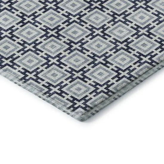 8' Navy Blue And Ivory Geometric Washable Round Rug With UV Protection Photo 7