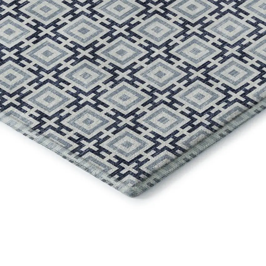 8' Navy Blue And Ivory Geometric Washable Round Rug With UV Protection Photo 7