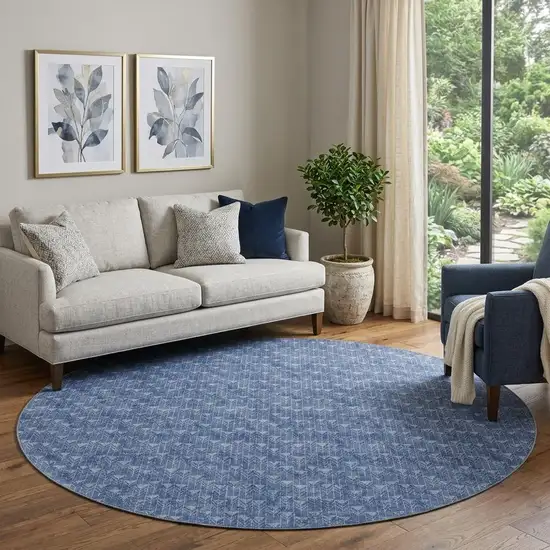 8' Navy Blue And Ivory Geometric Washable Round Rug With UV Protection Photo 1