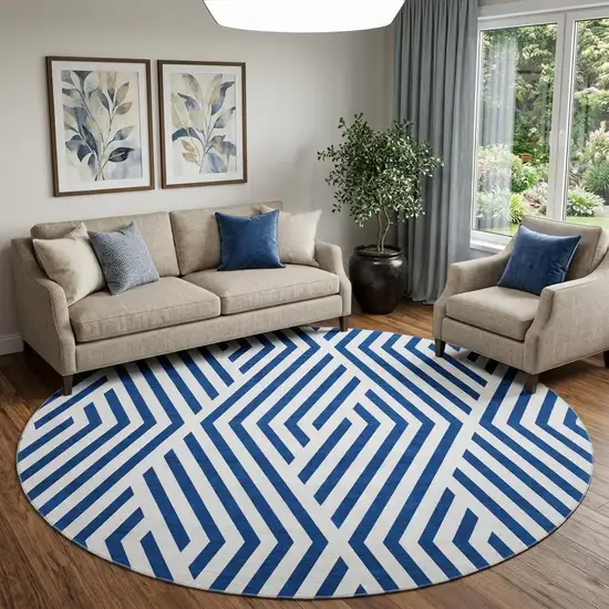 8' Navy Blue And Ivory Geometric Washable Round Rug With UV Protection Photo 1