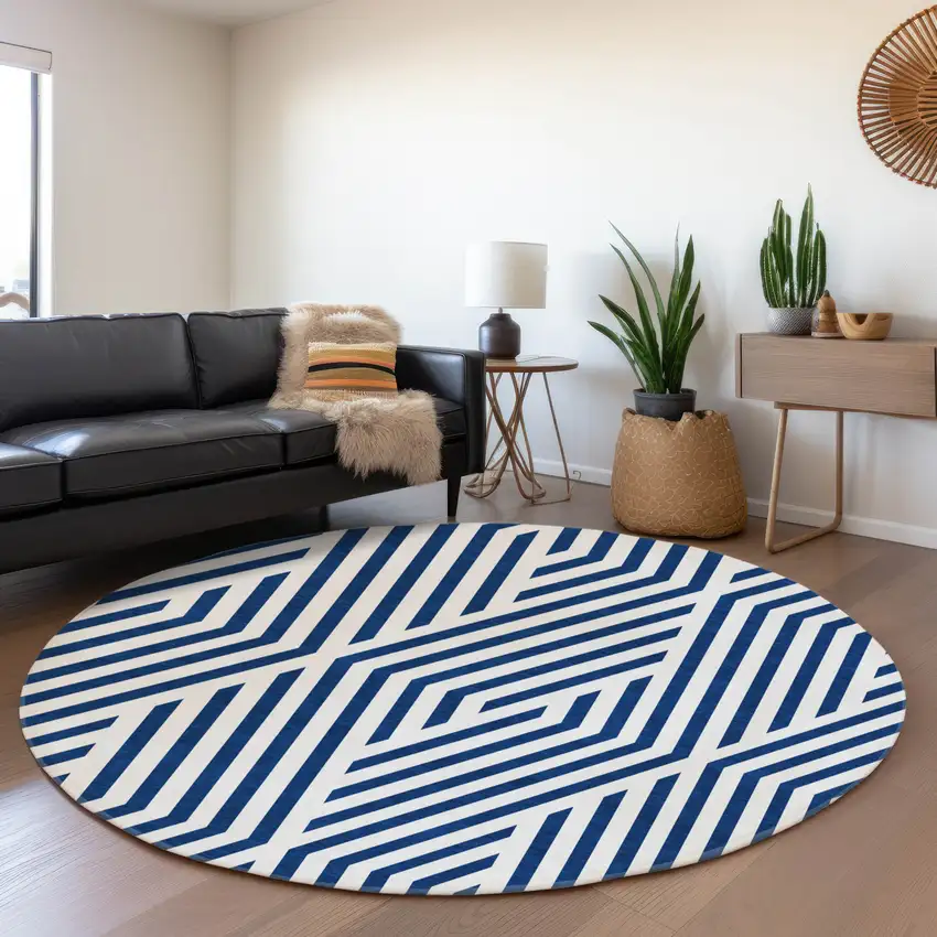 8' Navy Blue And Ivory Geometric Washable Round Rug With UV Protection Photo 5