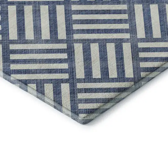 8' Navy Blue And Ivory Geometric Washable Round Rug With UV Protection Photo 6