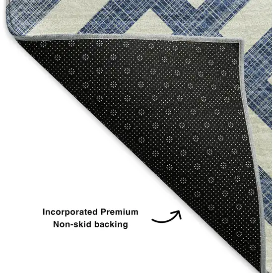 8' Navy Blue And Ivory Geometric Washable Round Rug With UV Protection Photo 5