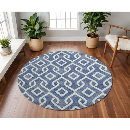 8' Navy Blue And Ivory Geometric Washable Round Rug With UV Protection Photo 2
