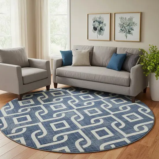 8' Navy Blue And Ivory Geometric Washable Round Rug With UV Protection Photo 1