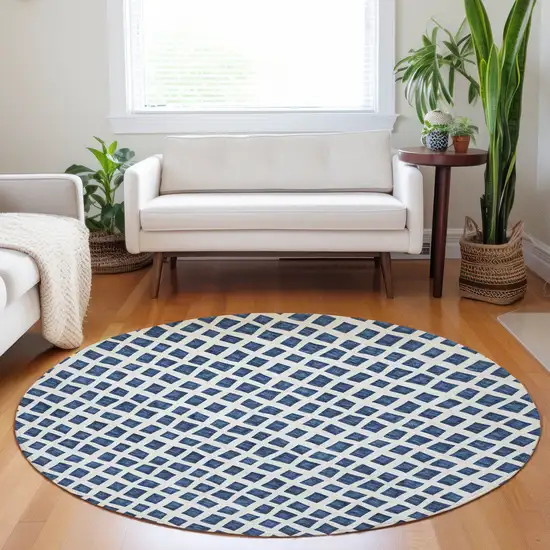 8' Navy Blue And Ivory Geometric Washable Round Rug With UV Protection Photo 5
