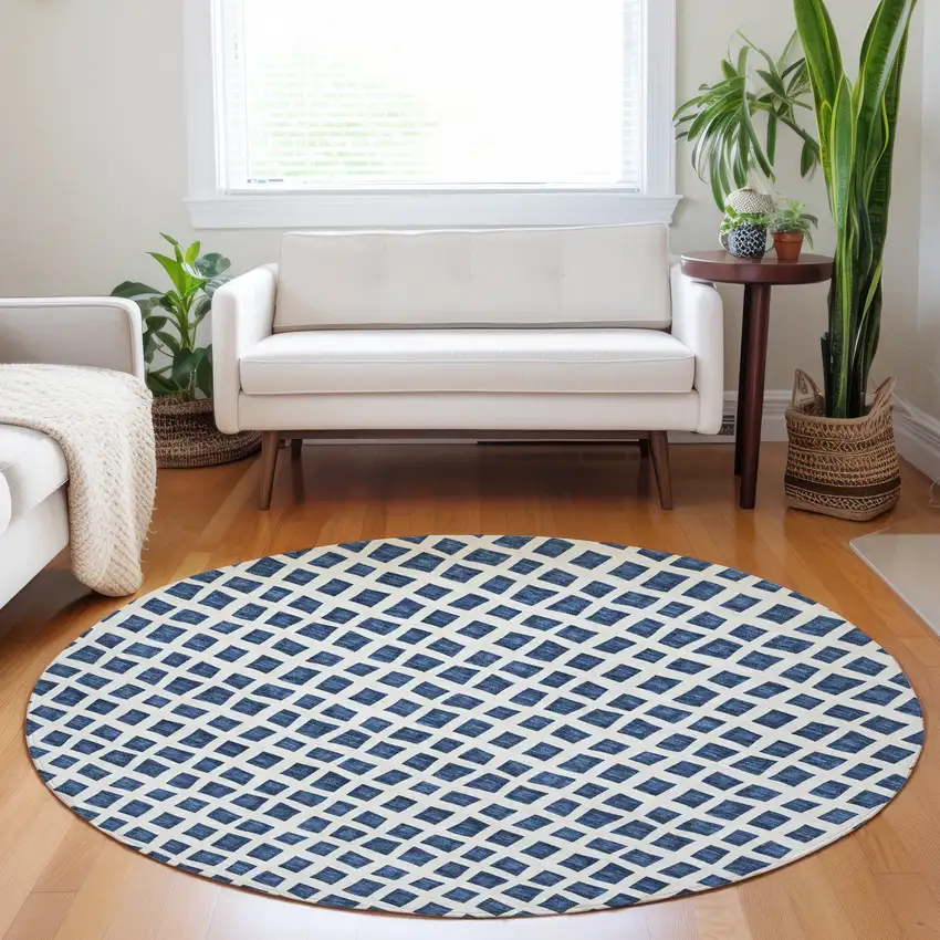 8' Navy Blue And Ivory Geometric Washable Round Rug With UV Protection Photo 5