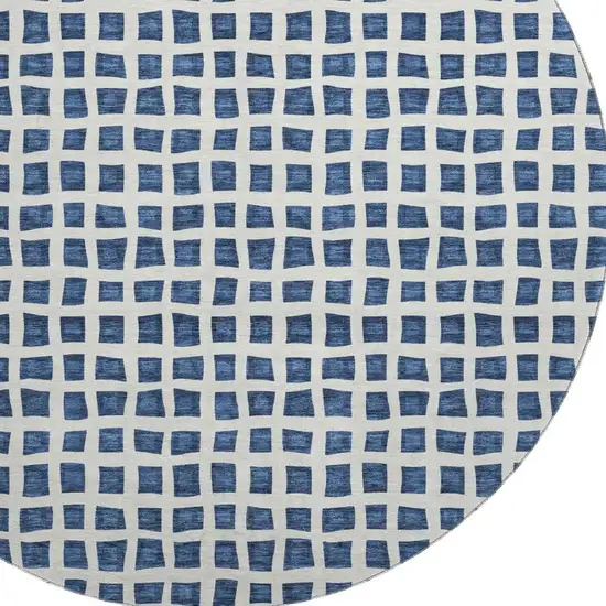 8' Navy Blue And Ivory Geometric Washable Round Rug With UV Protection Photo 3