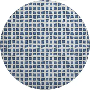Photo of 8' Navy Blue And Ivory Geometric Washable Round Rug With UV Protection
