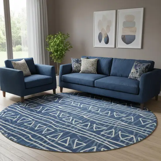 8' Navy Blue And Ivory Geometric Washable Round Rug With UV Protection Photo 1