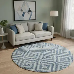 Photo of 8' Navy Blue And Ivory Geometric Washable Round Rug With UV Protection