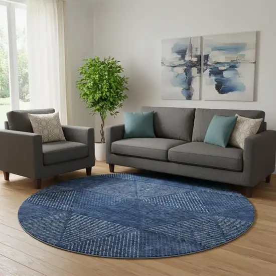 8' Navy Blue And Ivory Geometric Washable Round Rug With UV Protection Photo 1