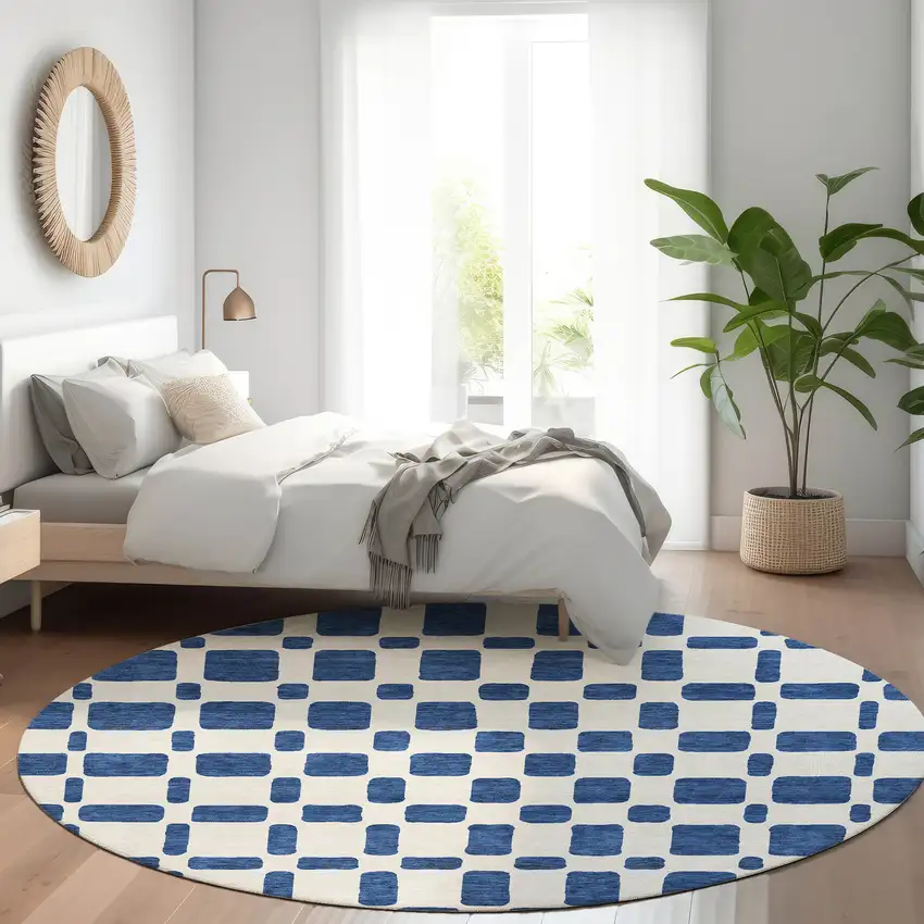 8' Navy Blue And Ivory Geometric Washable Round Rug With UV Protection Photo 5