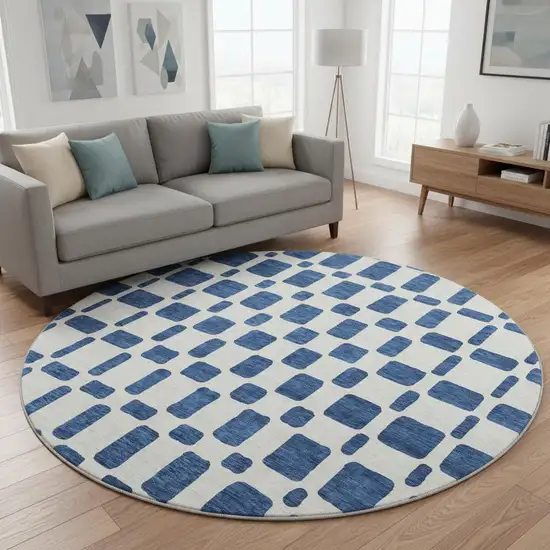 8' Navy Blue And Ivory Geometric Washable Round Rug With UV Protection Photo 2