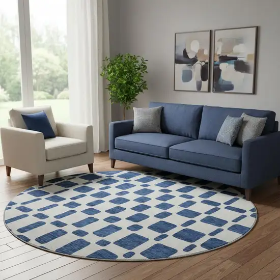 8' Navy Blue And Ivory Geometric Washable Round Rug With UV Protection Photo 2