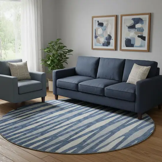 8' Navy Blue And Ivory Geometric Washable Round Rug With UV Protection Photo 1