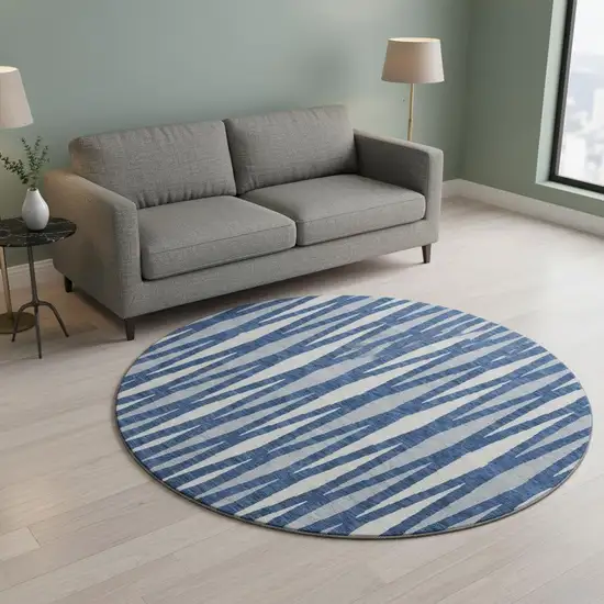 8' Navy Blue And Ivory Geometric Washable Round Rug With UV Protection Photo 2