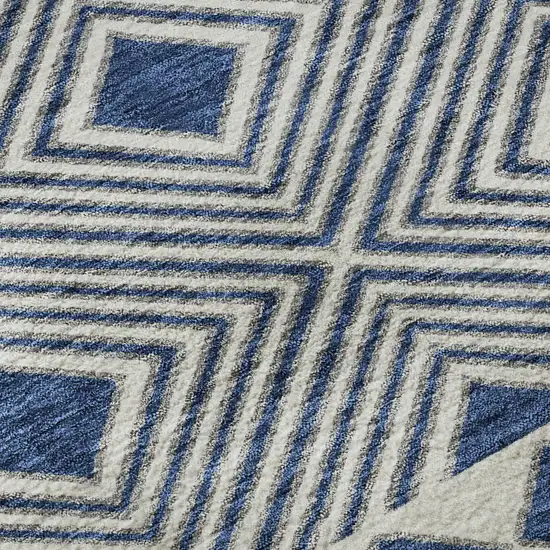 8' Navy Blue And Ivory Geometric Washable Round Rug With UV Protection Photo 9