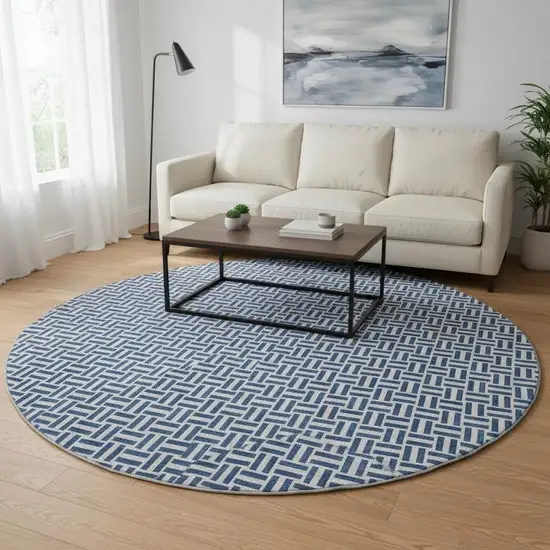 8' Navy Blue And Ivory Geometric Washable Round Rug With UV Protection Photo 2