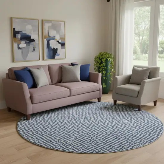 8' Navy Blue And Ivory Geometric Washable Round Rug With UV Protection Photo 1