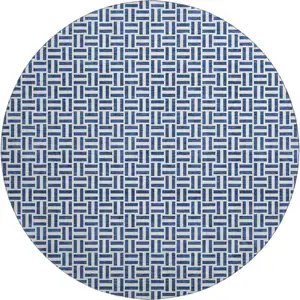 Photo of 8' Navy Blue And Ivory Geometric Washable Round Rug With UV Protection