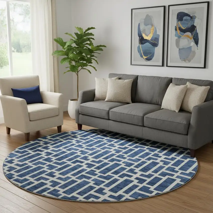 8' Navy Blue And Ivory Geometric Washable Round Rug With UV Protection Photo 1