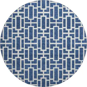 Photo of 8' Navy Blue And Ivory Geometric Washable Round Rug With UV Protection