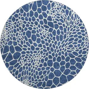 Photo of 8' Navy Blue And Ivory Geometric Washable Round Rug With UV Protection