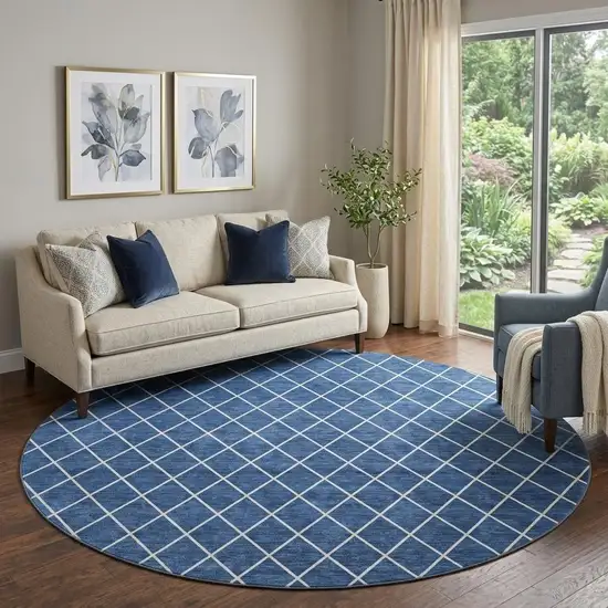 8' Navy Blue And Ivory Geometric Washable Round Rug With UV Protection Photo 1
