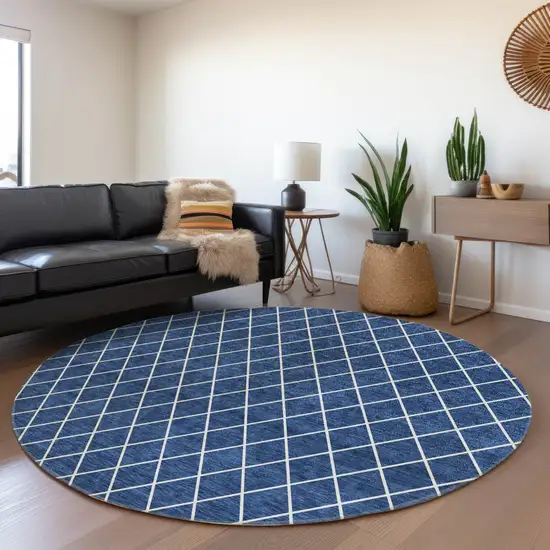 8' Navy Blue And Ivory Geometric Washable Round Rug With UV Protection Photo 4