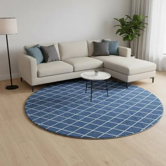 8' Navy Blue And Ivory Geometric Washable Round Rug With UV Protection Photo 2