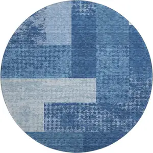 Photo of 8' Navy Blue And Ivory Geometric Washable Round Rug With UV Protection
